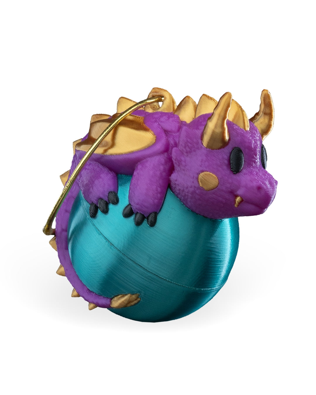 Dragonament, a dragon sleeping on an ornament